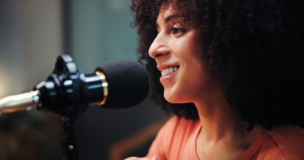 Podcast,,Studio,And,Happy,Woman,With,Mic,Talking,For,Radio